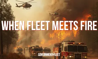 A wildfire in a forest with firefighters and helicopters and a lot of smoke in the air. 