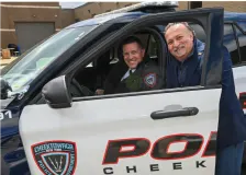Officer smiling with an executive
