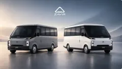 Two buses with a logo above them. 