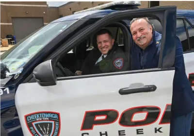 Officer smiling with an executive