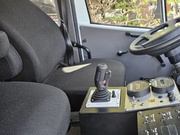 Interior cabin view of Monterra 6x6 looking out driver door
