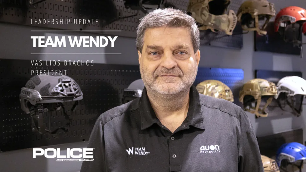Leadership update graphic featuring Team Wendy President Vasilios Brachos standing in front of a display of protective helmets, with POLICE Law Enforcement Solutions branding and text announcing his appointment as company president.