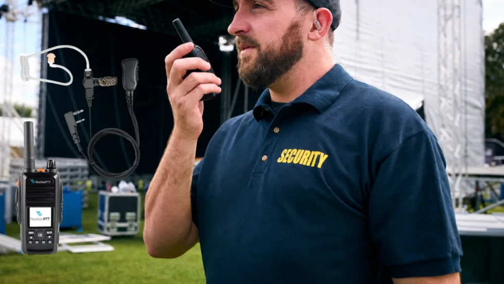 Security officer wearing an earpiece uses a handheld two-way radio at an outdoor event, with PositionPTT push-to-talk radio accessories and earpiece shown alongside for professional communications.