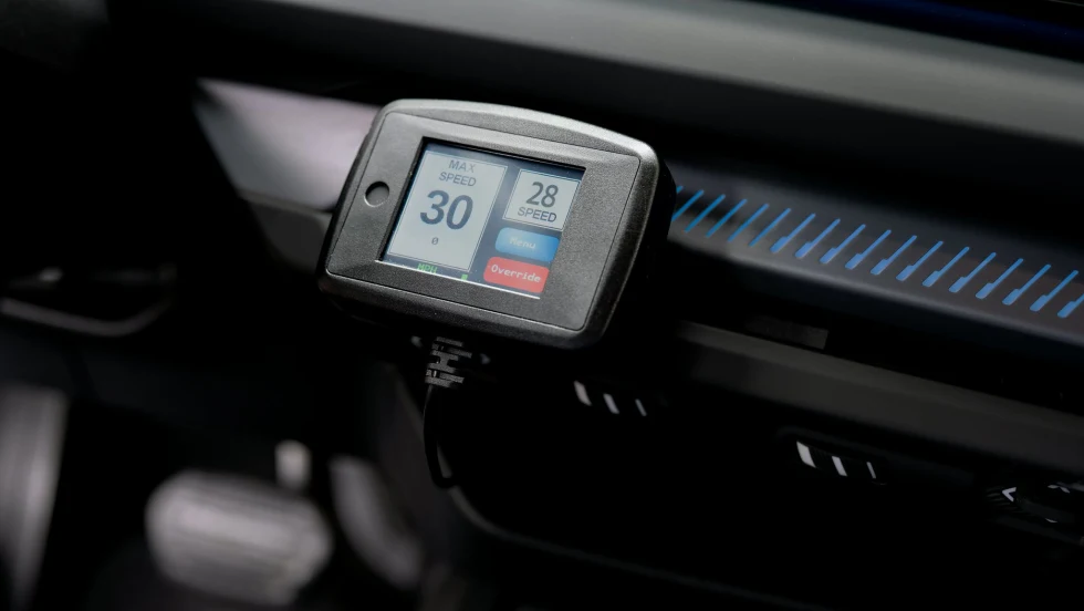 Digital vehicle display showing speed and driving information