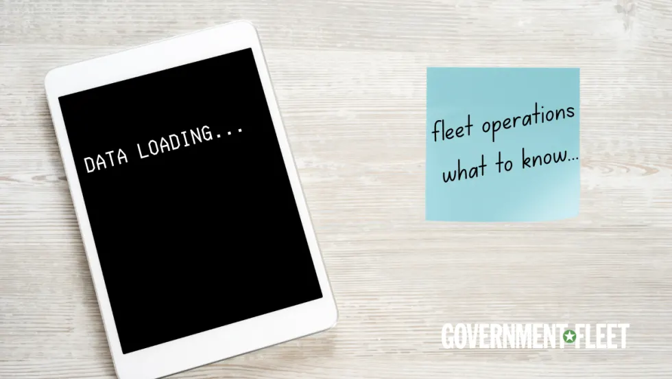 a graphic of a tablet with city vehicles.