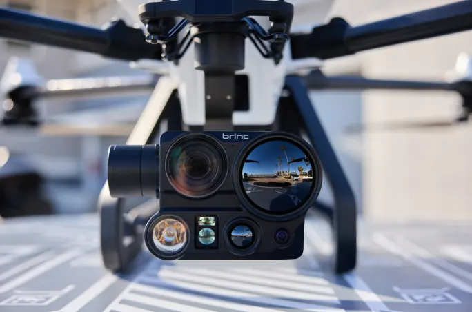 Closeup image of a camera on the front of a drone.