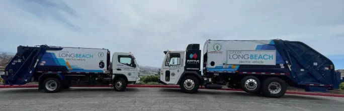 Two Long Beach refuse trucks.