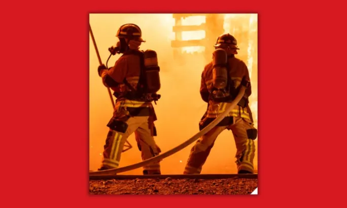 two firefighters on the frontline