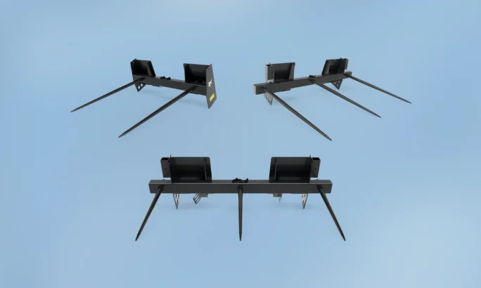 Bobcat bale spear attachment for lifting and moving round or square bales.