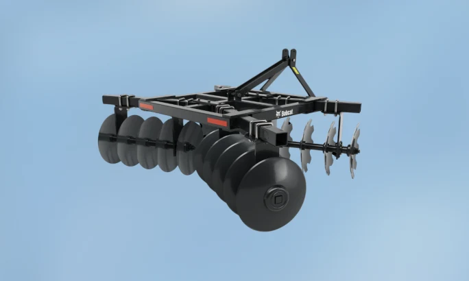 Bobcat disc harrow attachment designed for breaking up soil and preparing seedbeds.
