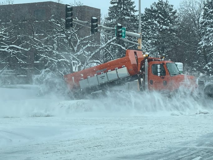 A dakota county snow plow.