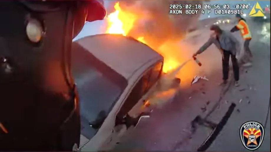 BWC Video: Officer and Firefighter Rescue Woman from Burning Truck