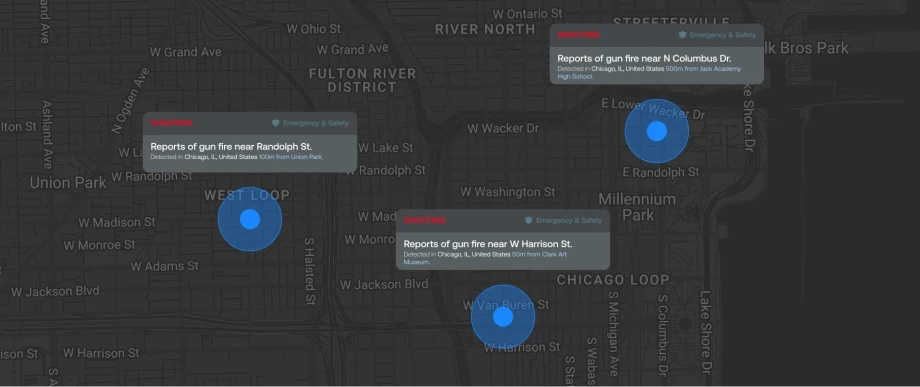 Dark map of downtown Chicago displaying three emergency alerts for reported gunfire near Randolph Street, W Harrison Street, and N Columbus Drive. Blue circular markers indicate locations near Union Park, Clark Art Museum, and Jack Academy High School.