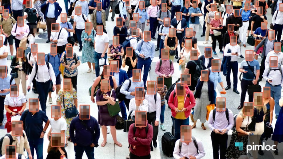 Overhead view of a crowded public space with AI-generated boxes obscuring faces, illustrating automated facial anonymization and privacy protection in video surveillance. Pimloc logo appears in the lower-right corner.