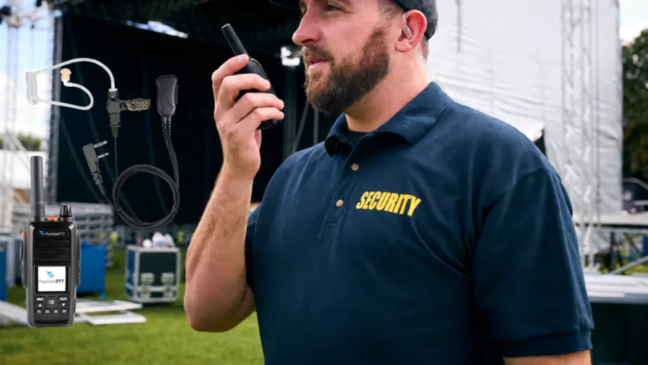 Security officer wearing an earpiece uses a handheld two-way radio at an outdoor event, with PositionPTT push-to-talk radio accessories and earpiece shown alongside for professional communications.