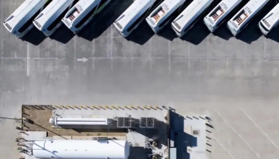 A drone shot of vehicles parked.