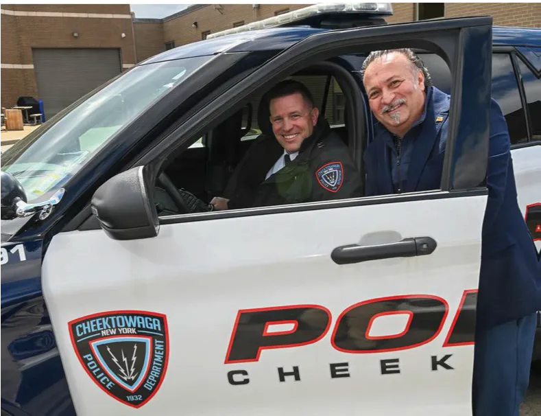 Officer smiling with an executive