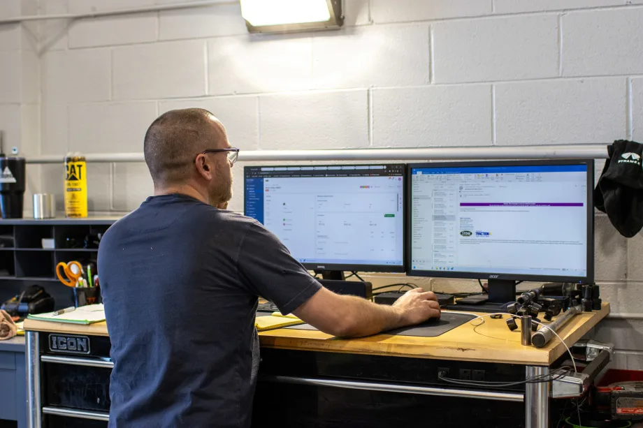 A man at a computer.