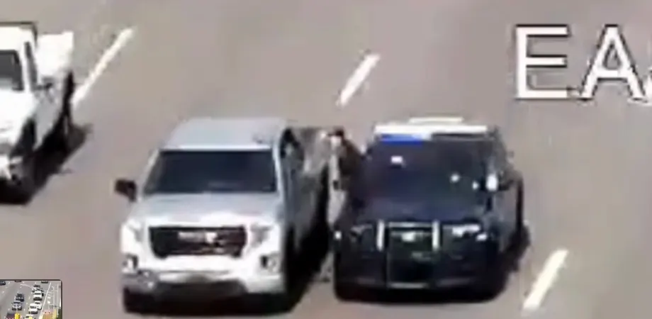 Video: Deputy Climbs from SUV into Moving Truck to Stop Driver Experiencing Medical Crisis