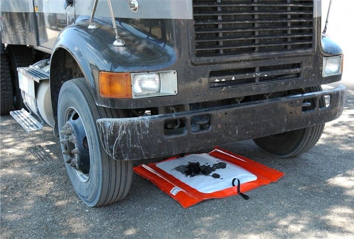 Weighted Spill Tray