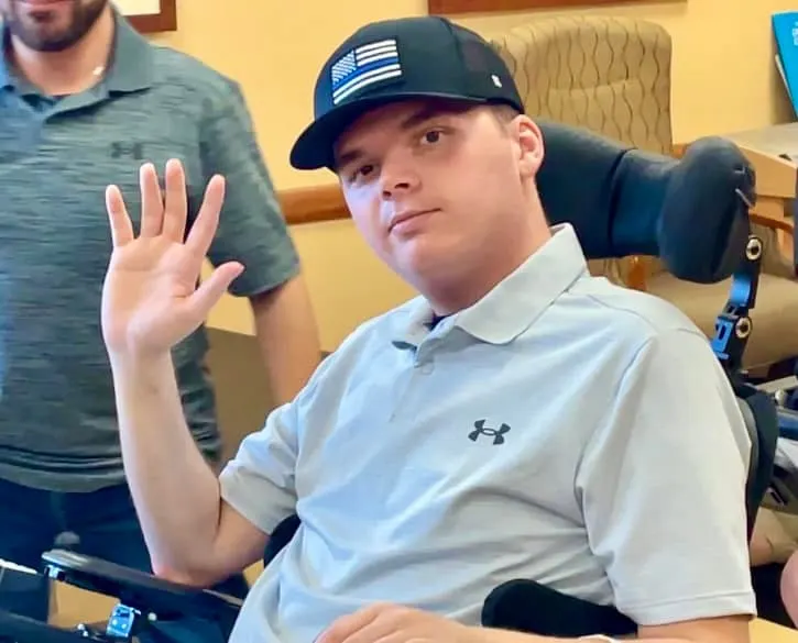 Louisville Officer Shot in Head During Bank Attack Goes Home from Rehab