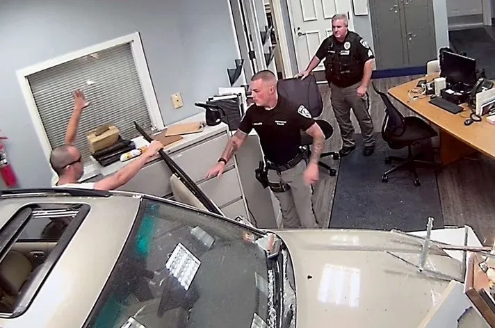 Man Charged with Driving SUV into Home, Then Police Station