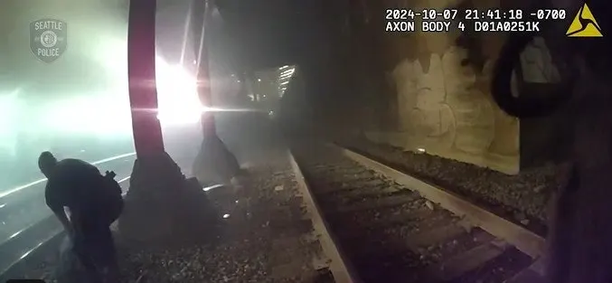 Video: Seattle Officers Rescue Man from Train Tracks as Train Flashes Past